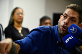 Opposition former governor candidate for Miranda State, Requesens, addresses the media, in Caracas