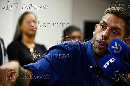 Opposition former governor candidate for Miranda State, Requesens, addresses the media, in Caracas