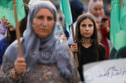 Syrian Kurds attend protest in solidarity with people in Sweida, in Qamishli