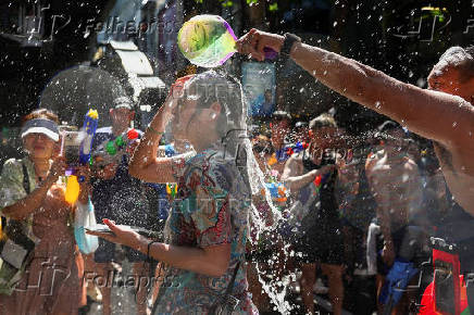 Revellers celebrate New Year Water Festival in Bangkok