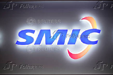 FILE PHOTO: A logo of Semiconductor Manufacturing International Corporation (SMIC) is seen at China International Semiconductor Expo (IC China 2020) following the coronavirus disease (COVID-19) outbreak in Shanghai