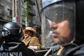 Supporters of Evo Morales's candidacy clash with police, in La Paz