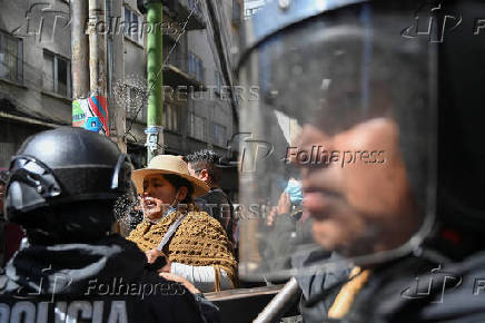 Supporters of Evo Morales's candidacy clash with police, in La Paz