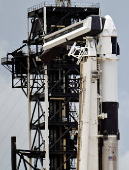 A Dragon crew capsule sits atop a Falcon 9 rocket at Launch Complex 39-A after the Axiom-4 crewed mission to the International Space Station was delayed by technical issues