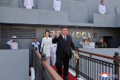 North Korean leader Kim Jong Un attends the launching ceremony of a warship that had been damaged upon its first attempt to launch