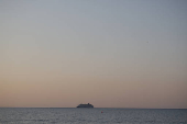 A view of the Crown Iris, a vessel which will be used to assist in the departure of Israelis from Cyprus,  is seen off the coast of Larnaca