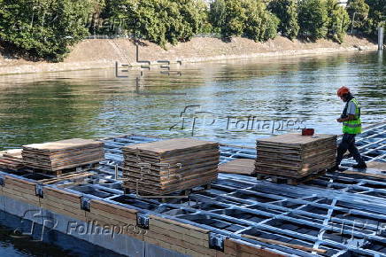 Seine river prepares for swimming season as part of Paris Plages