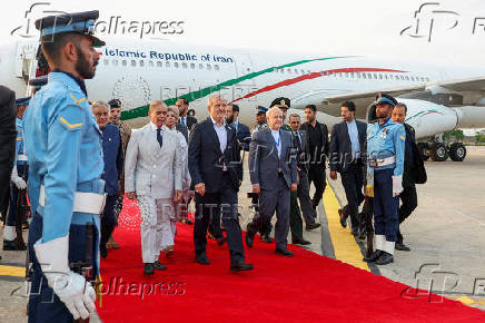 Iranian President Pezeshkian is welcomed by Pakistani PM Sharif in Islamabad