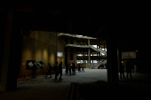 Visitors walk through the 