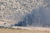 Smoke rises after a drone attack targeted oil facilities in the Zakho area of Iraq's Kurdistan region