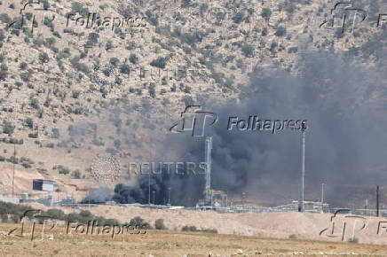 Smoke rises after a drone attack targeted oil facilities in the Zakho area of Iraq's Kurdistan region