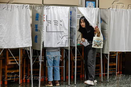 Voters cast their ballots in recall election for several Taiwanese legislators