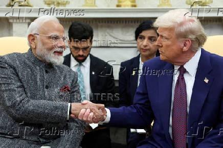 FILE PHOTO: FILE PHOTO: Indian Prime Minister Narendra Modi meets with U.S. President Donald Trump at the White House