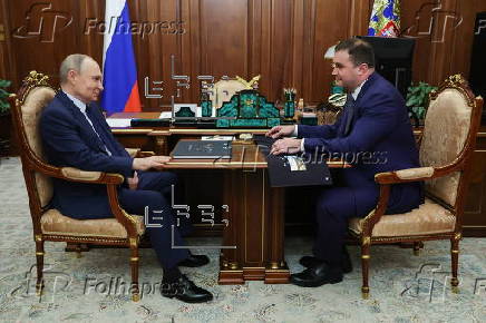 Russian President Putin meets Omsk Region Governor Khotsenko in Moscow