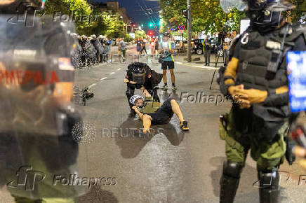 Standoff between supporters of the ruling party and anti-government protesters in Belgrade