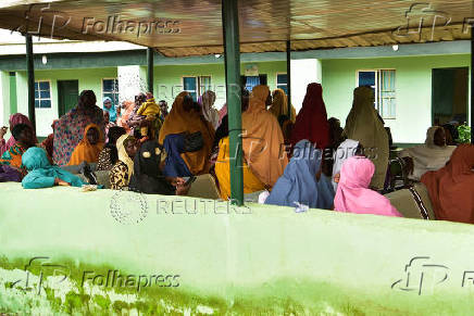 People wait to receive mpox vaccination at a Primary Health Care in Nigeria