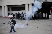 Protesters gather around the Los Angeles Federal Building after multiple detentions by ICE, in Los Angeles