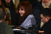 Argentina's former President Cristina Fernandez de Kirchner walks out of a building before participating in an event to commemorate the Peronist Resistance Day at the Partido Justicialista national building