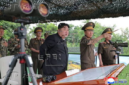 North Korean leader Kim Jong Un oversees firing contest among artillery units of the Korean People's Army
