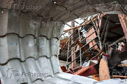 A house damaged by Cambodia's shelling is pictured in Sisaket province, ahead of ceasefire talks in Malaysia on the deadly border conflict between Thailand and Cambodia