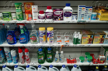 Consumer and cleaning products are displayed for sale at a pharmacy in the Chinatown neighborhood of Manhattan in New York City