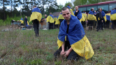 Ukrainian POWs are seen after a swap at an unknown location in Ukraine