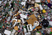 FILE PHOTO: Discarded plastics and other materials are collected at a barrier in the water that stops them from flowing into the sea in Colombo