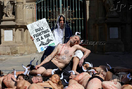 Protesters demonstrate for the permanent end of bullfighting and running of the bulls, a day before the start of the the San Fermin festival, in Pamplona