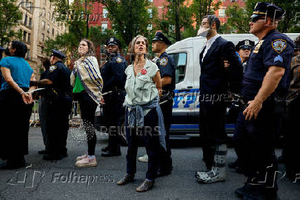 People protest against ICE outside U.S. immigration court in New York