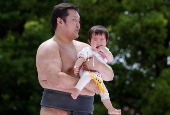 Babies take part in 'Nakizumo' or baby crying sumo contest at Senso-ji temple in Tokyo
