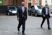 Britain's Foreign Secretary David Lammy walks on Downing Street in London