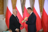 Polish President-elect Karol Nawrocki receives the winning certificate