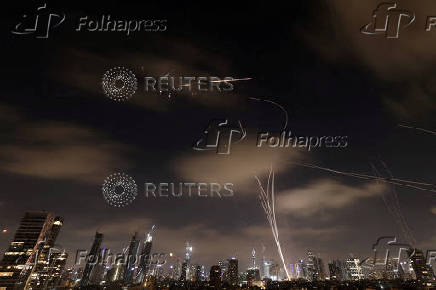 Missiles launched from Iran are intercepted as seen from Tel Aviv