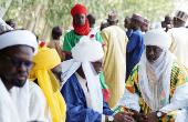 Mourners wait to gain access to former president Buhari's residence ahead of his burial
