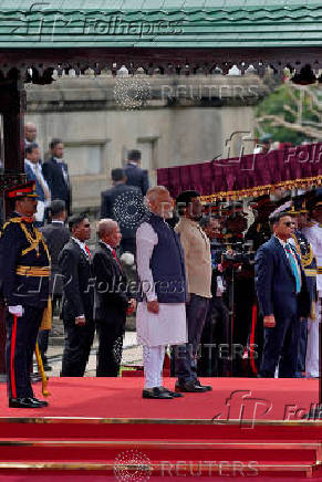 India's PM Modi attends his welcoming ceremony in Colombo