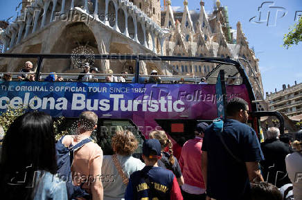 Network of cities affected by tourism in southern Europe stage protest against mass tourism at La Sagrada Familia Basilica in Barcelona