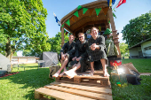 Members of the band KAJ pose in the sauna of the BastutiBasel fan project in Basel