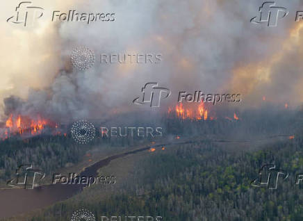 Smoke rises from the Nopiming Provincial Park wildfire EA061 east of Bird River