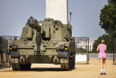 Helicopters and other heavy equipment staged for DC military parade