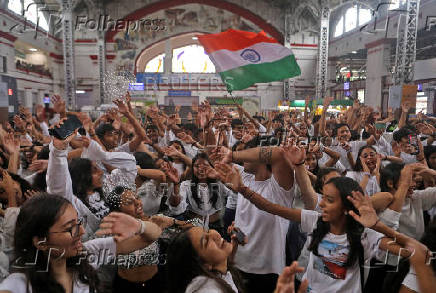 FILE PHOTO: College students perform during a flash mob as a tribute to the cultural diversity of India, in Mumbai