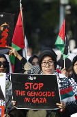 Pro Palestinians protest outside the US embassy in Jakarta