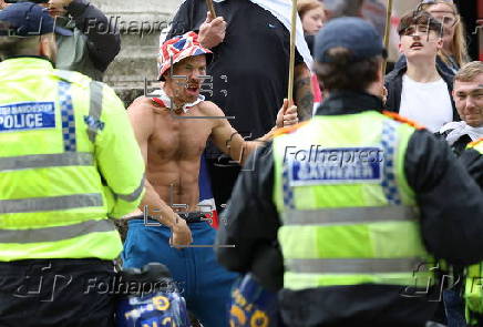 Britain First group hold 'March for Remigration' in Manchester