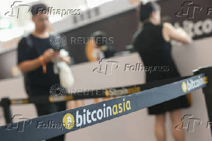 People attend the Bitcoin Asia conference in Hong Kong