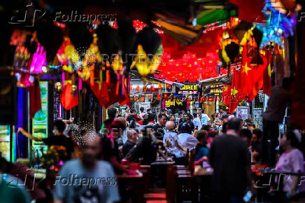 People spend their evening at Hanoi's Old Quarter, in Hanoi