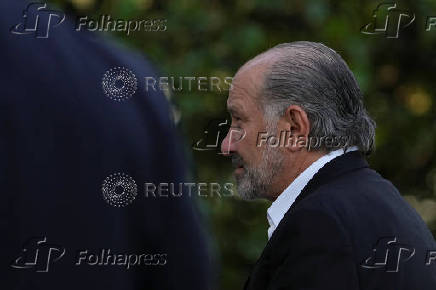 U.S. Secretary of Commerce Howard Lutnick arrives at the White House in Washington
