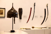 Swords, daggers and armours, including the ?World-Capturer? Sword of Shah Jahan, the blade dating to 17th century North India, are displayed at the Sotheby's, in Dubai
