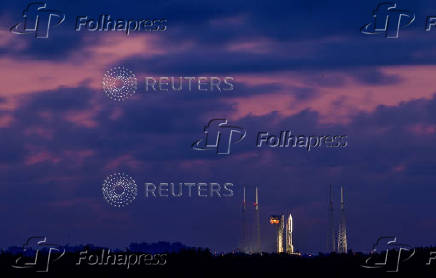 A United Launch Alliance Atlas V rocket stands on the pad with Amazon's Project Kuiper internet network satellites in Cape Canaveral