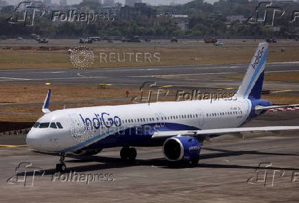 FILE PHOTO: FILE PHOTO: An IndiGo airlines passenger aircraft taxis on the tarmac at Chhatrapati Shivaji International airport in Mumbai, India