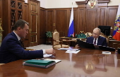 Russian President Vladimir Putin meets with Sports Minister Mikhail Degtyarev