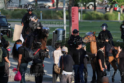 Protests against federal immigration sweeps continue, in Los Angeles